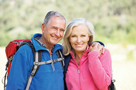 Photo of couple hiking. Link to Closely Held Business Stock.