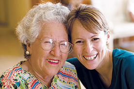 Photo of nurse and patient. Link to Gifts That Protect Your Assets.